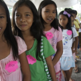 Girls at a World Vision Christmas event in the Philippines